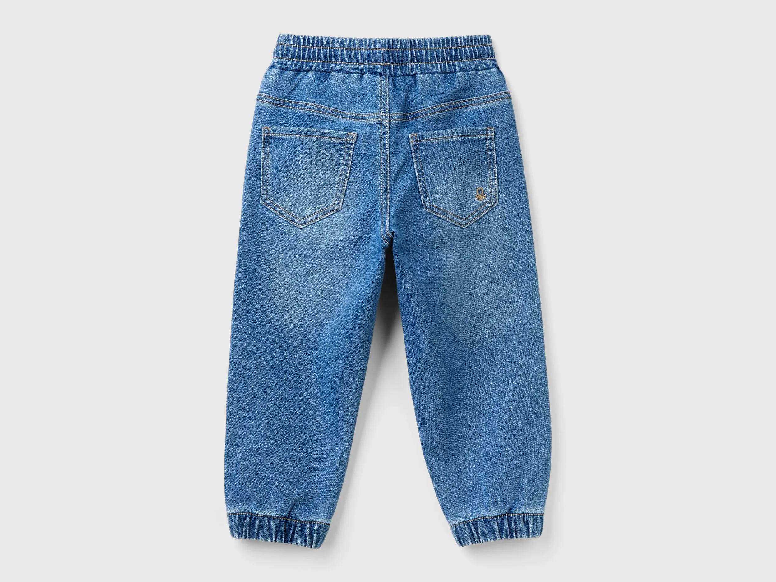 "Eco-Recycle" denim joggers - Blue | Benetton