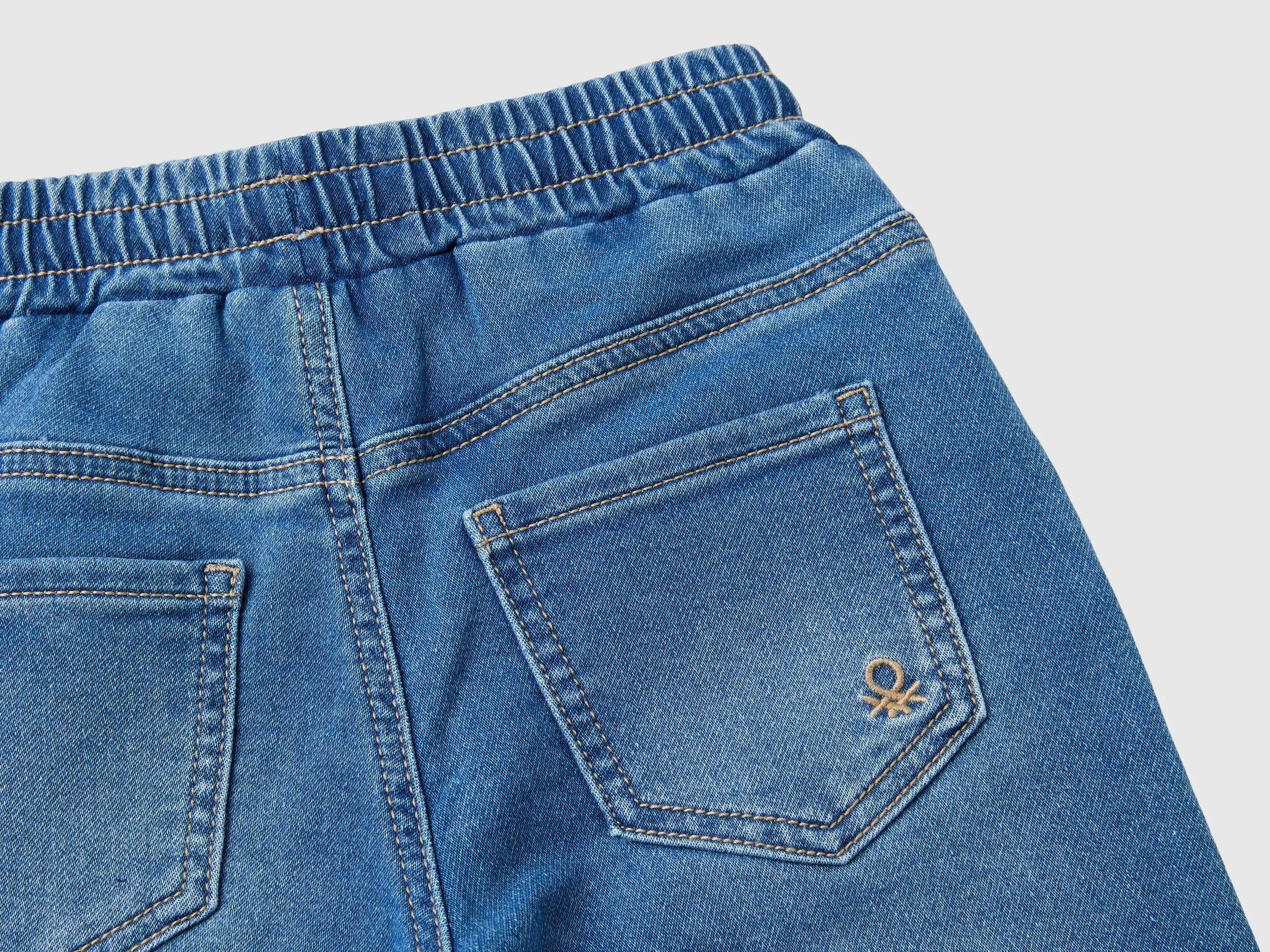 "Eco-Recycle" denim joggers - Blue | Benetton